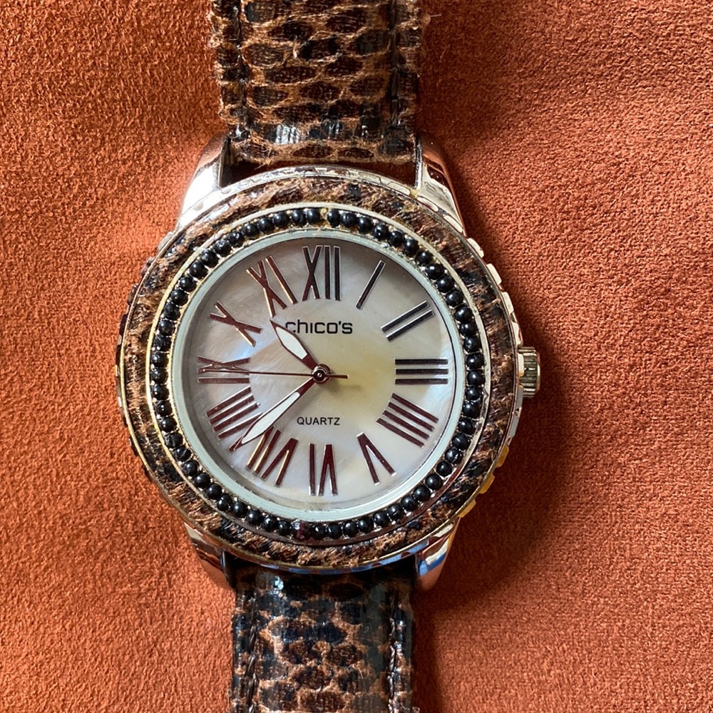Chico’s mother-of-pearl face brown watch.
